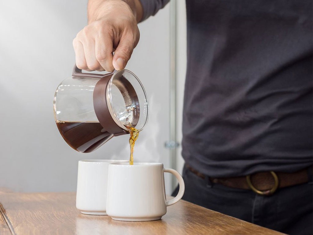 Uống cà phê với ít đường hoặc sữa đặc